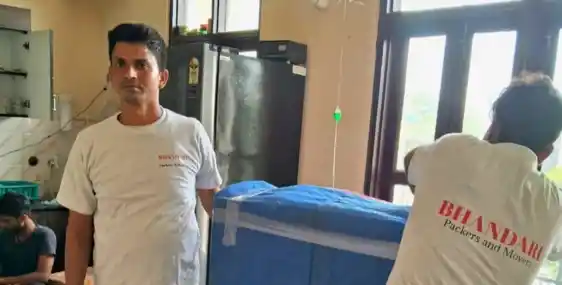 Professional Movers Packing Household Items