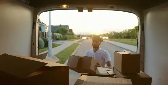 Professional Movers Packing Household Items